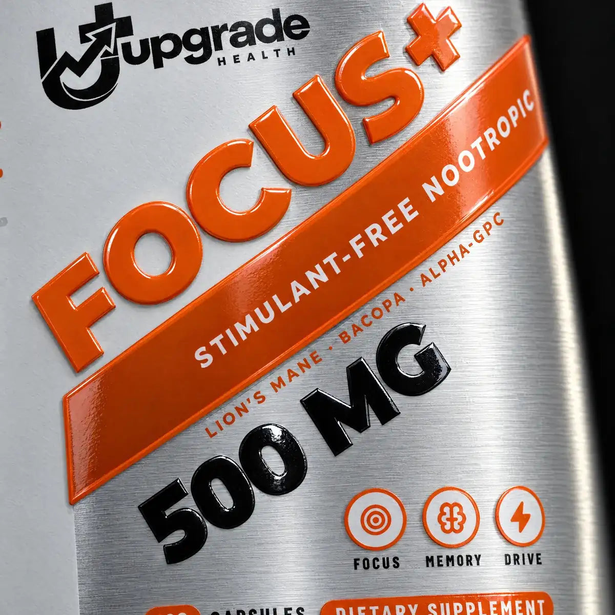 Brushed metal label with the raised gloss FOCUS+ wordmark
